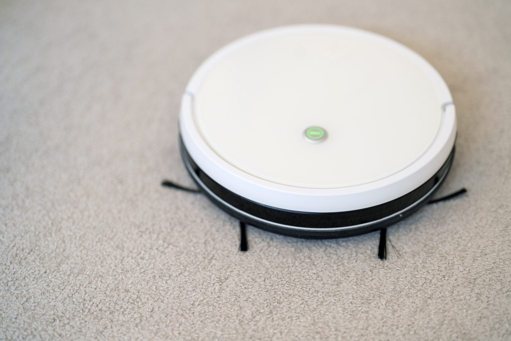 Robot vacuum cleaner on the carpet